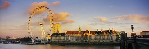 Framed Ferris wheel with buildings at waterfront, Millennium Wheel, London County Hall, Thames River, South Bank, London, England Print