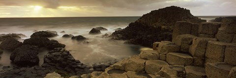 Framed Rock formations in the sea, Giant's Causeway, County Antrim, Northern Ireland Print