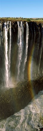 Framed Rainbow forms in the water spray in the gorge at Victoria Falls, Zimbabwe Print