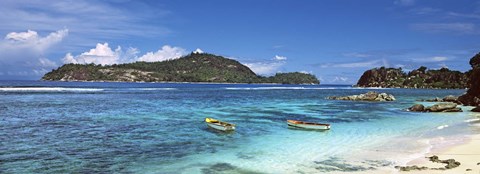 Framed Small fishing boats on Anse L&#39;Islette with Therese Island in background, Seychelles Print