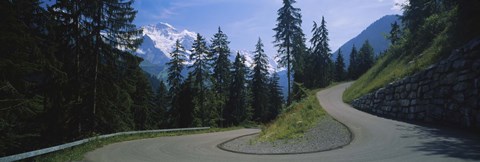 Framed Empty road passing through mountains, Bernese Oberland, Switzerland Print