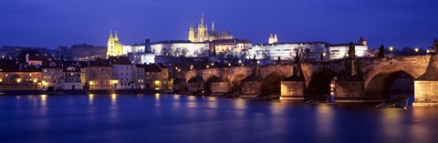 Framed Bridge across a river lit up at night, Charles Bridge, Vltava River, Prague, Czech Republic Print
