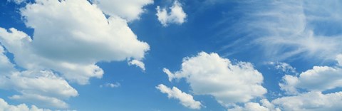 Framed Clouds against a pale blue sky Print