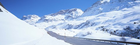 Framed Snow covered mountains on both sides of a road, St Moritz, Graubunden, Switzerland Print