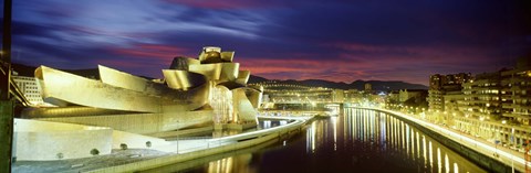 Framed Buildings lit up at dusk, Guggenheim Museum Bilbao, Bilbao, Vizcaya, Spain Print