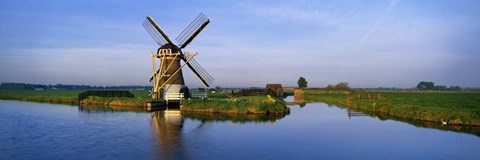 Framed Traditional Windmill On The Waterfront, Netherlands Print