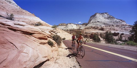Framed Two people cycling on the road, Zion National Park, Utah, USA Print