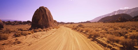 Framed Dirt road passing through an arid landscape, Californian Sierra Nevada, California, USA Print