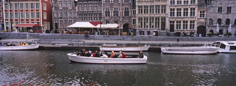 Framed High angle view of tourboats in a river, Leie River, Graslei, Ghent, Belgium Print