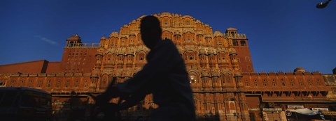 Framed Silhouette of a person riding a motorcycle in front of a palace, Hawa Mahal, Jaipur, Rajasthan, India Print