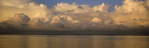 Framed Clouds over the sea Print