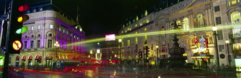 Framed Buildings lit up at night, Piccadilly Circus, London, England Print