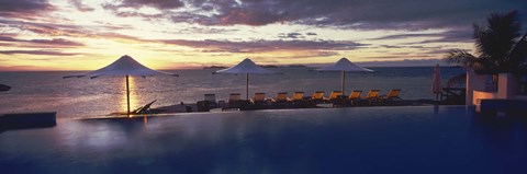 Framed Lounge chairs and patio umbrellas at a tourist resort, Matamanoa Island Resort, Mamanuca Islands, Fiji Print
