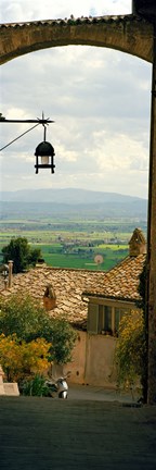 Framed Umbrian countryside viewed through an alleyway, Assisi, Perugia Province, Umbria, Italy Print
