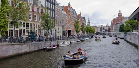 Framed Tourboats in a canal, Amsterdam, Netherlands Print