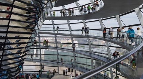 Framed Tourists near the mirrored cone at the center of the dome, Reichstag Dome, The Reichstag, Berlin, Germany Print
