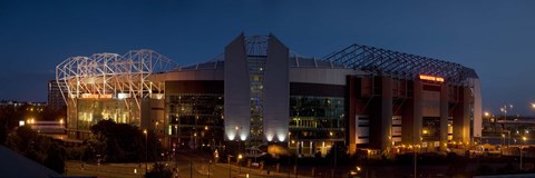 Framed Football stadium lit up at night, Old Trafford, Greater Manchester, England Print