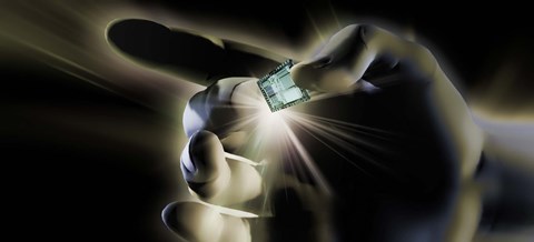 Framed Close-up of a person&#39;s hand holding micro chip Print