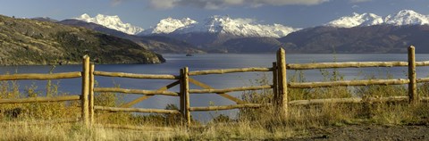 Framed Fence in front of a lake with mountains in the background, Lake General Carrera, Andes, Patagonia, Chile Print