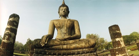 Framed Low angle view of a statue of Buddha, Sukhothai Historical Park, Sukhothai, Thailand Print