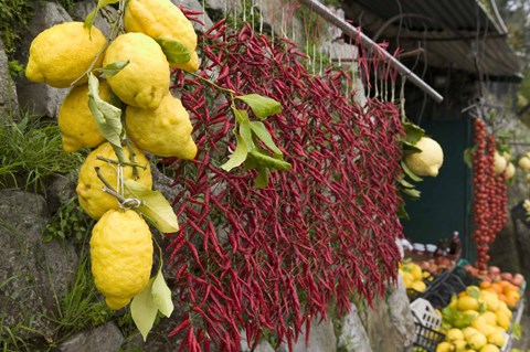 Framed Close-up of lemons and chili peppers in a market stall, Sorrento, Naples, Campania, Italy Print