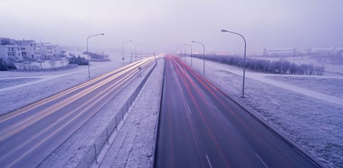 Framed Road running through a snow covered city, Reykjavik, Iceland Print
