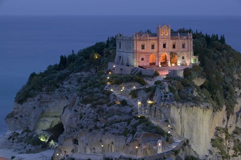 Framed High angle view of a church lit up at dusk on a cliff, Santa Maria dell Isola, Tropea, Calabria, Italy Print