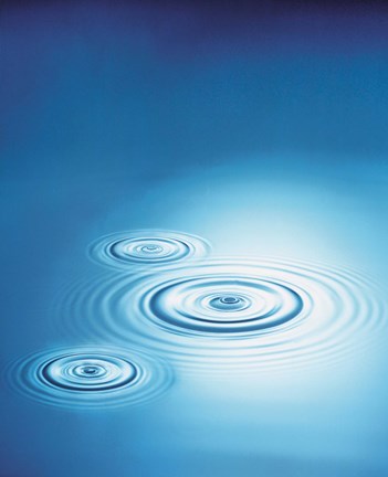Framed Three rings in blue water with bright light reflection Print