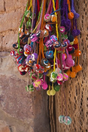 Framed Multi-colored hangings on wall, Tulmas, Purmamarca, Quebrada De Humahuaca, Argentina Print