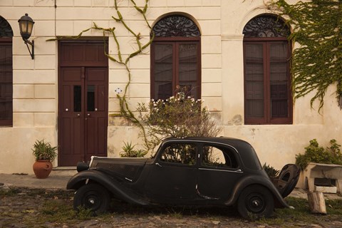 Framed Vintage car parked in front of a house, Calle De Portugal, Colonia Del Sacramento, Uruguay Print