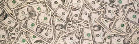 Framed Close-up of a pile of US Dollar bills Print