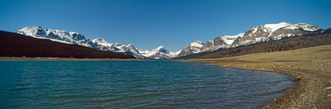 Framed Lake with snow covered mountains in the background, Sherburne Lake, US Glacier National Park, Montana, USA Print