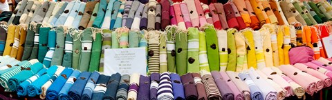 Framed Tablecloths for sale at a market stall, Lourmarin, Vaucluse, Provence-Alpes-Cote d&#39;Azur, France Print