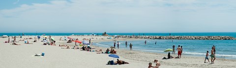 Framed Tourists on the beach, Saintes-Maries-De-La-Mer, Bouches-Du-Rhone, Provence-Alpes-Cote d'Azur, France Print