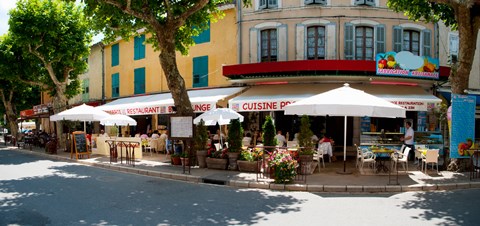 Framed Restaurants during lunch hour along the Rue Du Marche, Riez, Alpes-de-Haute-Provence, Provence-Alpes-Cote d&#39;Azur, France Print