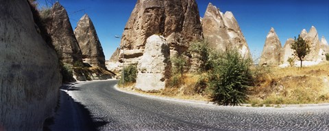 Framed Winding road passing through rocks, Cappadocia, Central Anatolia Region, Turkey Print