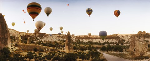 Framed Hot air balloons over landscape at sunrise, Cappadocia, Central Anatolia Region, Turkey Print