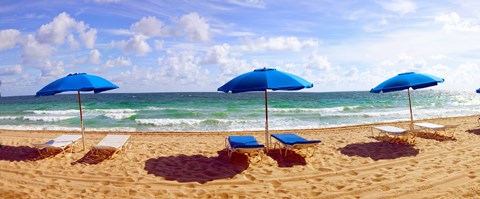 Framed Lounge chairs and beach umbrellas on the beach, Fort Lauderdale Beach, Florida, USA Print