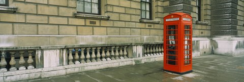 Framed Telephone booth at the roadside, London, England Print