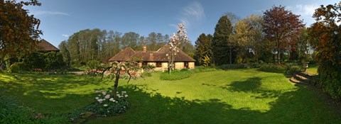 Framed Millstream cottages, Egerton, Kent, England Print