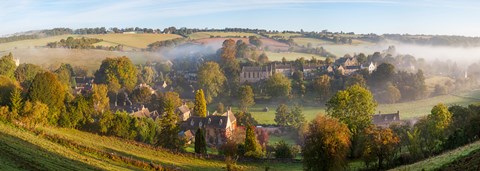 Framed High angle view of a village, Naunton, Cotswold Hills, Gloucestershire, England Print