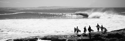 Framed Silhouette of surfers standing on the beach, Australia (black and white) Print