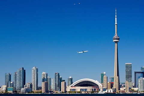Framed Airplane over city skylines, CN Tower, Toronto, Ontario, Canada 2011 Print