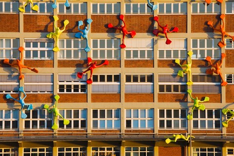 Framed Flossies Figures covering a Building, Medienhafen, Dusseldorf, North Rhine Westphalia, Germany Print