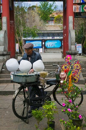 Framed Candy Floss Vendor selling Cotton Candies in Old Town Dali, Yunnan Province, China Print