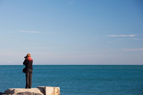 Framed Woman photographing with a camera at Le Cap d' Agde, Herault, Languedoc-Roussillon, France Print