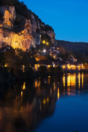 Framed Buildings lit up at evening, Dordogne River, La Roque-Gageac, Dordogne, Aquitaine, France Print