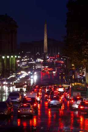 Framed Elevated view of traffic on the road at night viewed from Eglise Madeleine church, Rue Royale, Paris, Ile-de-France, France Print