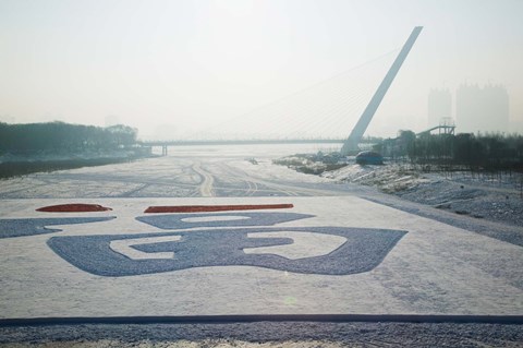 Framed Songhuajiang Highway Bridge across the frozen Songhua River, Harbin, China Print