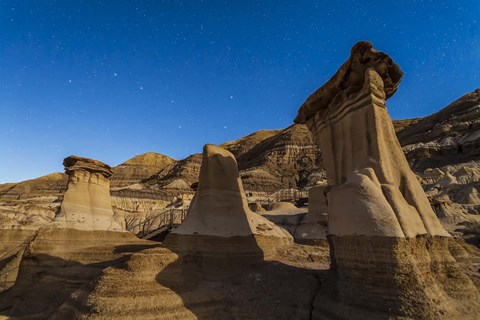 Framed Stars over the hoodoos in the Red Deer River valley, Alberta, Canada Print